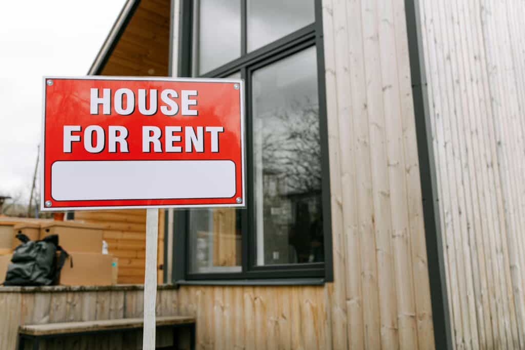 Large-format signage of a house for rent. Zippy printz